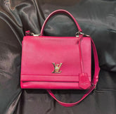 Louis Vuitton Lock Me shoulder/crossbody bag