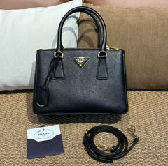 Prada small black and gold Saffiano leather shoulder bag